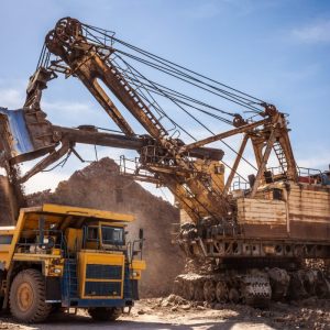 excavator-loading-dump-truck-coal-mining-scaled.jpg