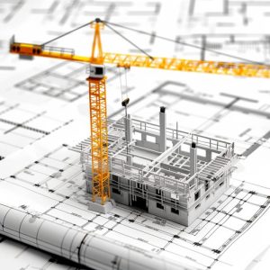 model-building-with-yellow-crane-top-it-e1750330175833.jpg