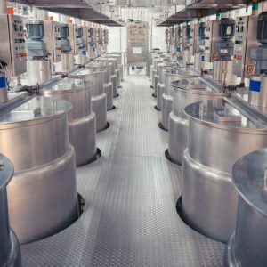 modern-coconut-milk-cellar-with-stainless-steel-tanks-industry-scaled-e1750330136527.jpg