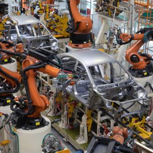 modern-technology-assembly-cars-plant-automotive-industry-shop-production-assembly-machines-top-view-process-welding-parts-car-scaled.jpg
